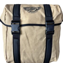 Beige canvas messenger bag with dark navy straps and two plastic buckles, close-up of the front.