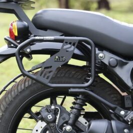 Rear motorcycle with a black frame rack mounted over the rear wheel; visible MT logo on the rack and a gray seat.