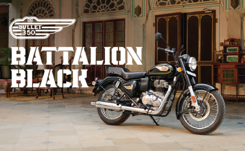 IMG_9722 - laxmiautocare.com Royal Enfield Bullet 350 motorcycle indoors on a tiled floor, with bold 'Battalion Black' text overlay