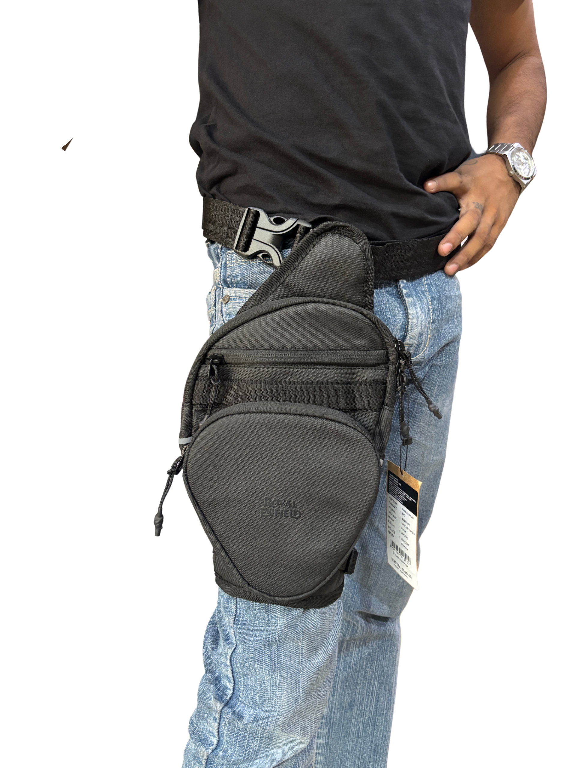 17fd97d8-fd80-430b-962e-543f7789b357 - laxmiautocare.com Man wearing a black rounded hip bag attached to a tactical belt at the waist, with one hand on his hip and a silver wristwatch visible.