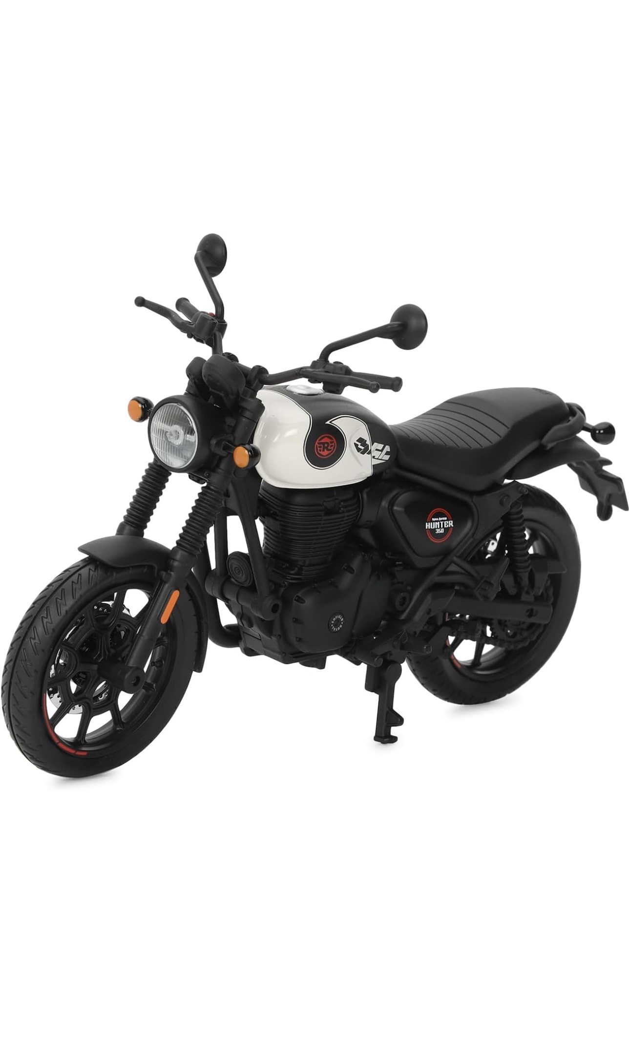 Screenshot - laxmiautocare.com Scale model of a black retro motorcycle with a white fuel tank and orange indicators.