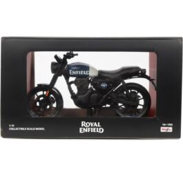 Miniature Royal Enfield motorcycle in a black display box, showing a blue-and-white tank and detailed black frame through a clear window.
