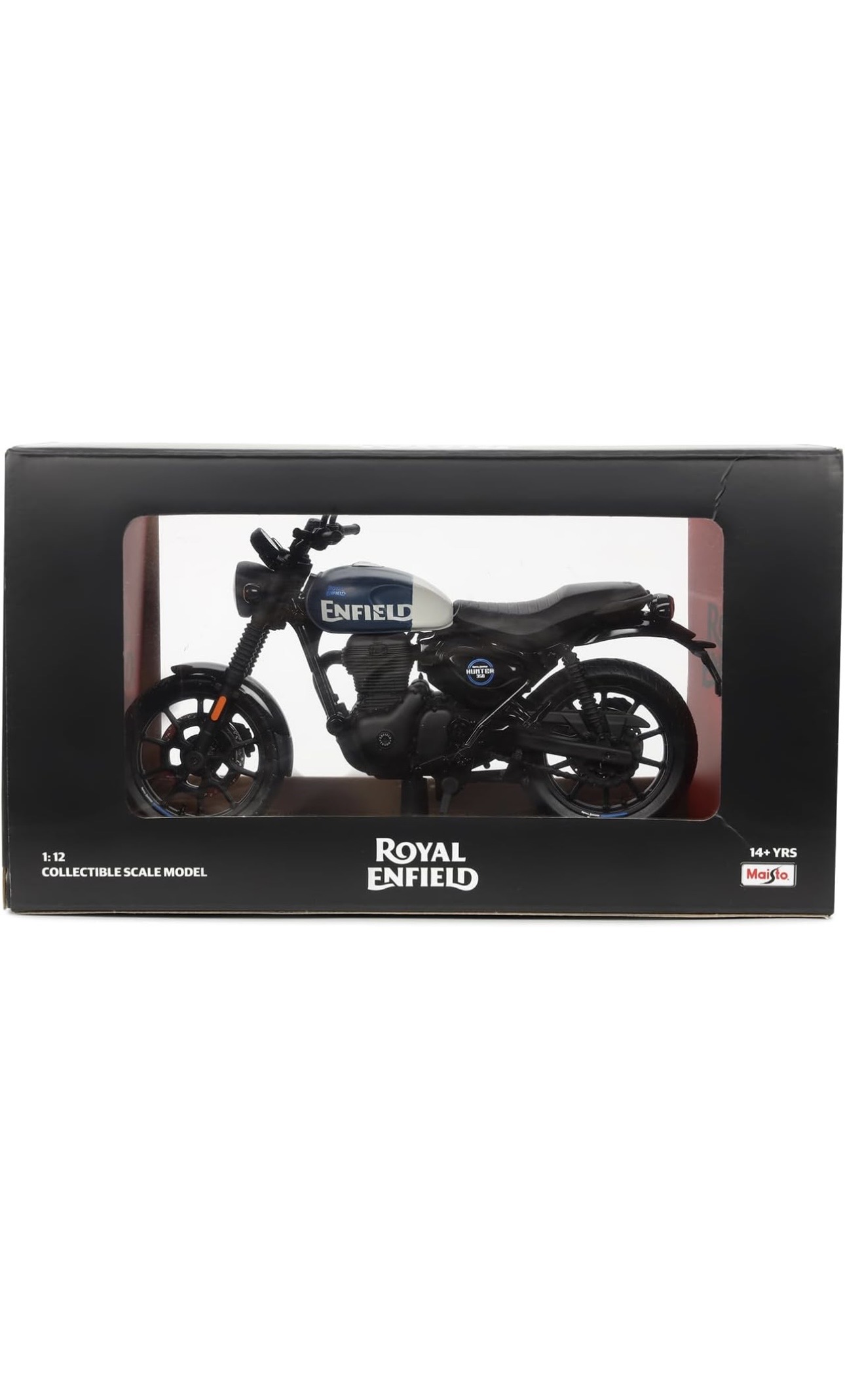 Screenshot - laxmiautocare.com Miniature Royal Enfield motorcycle in a black display box, showing a blue-and-white tank and detailed black frame through a clear window.