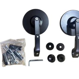 Two black metal wheel assemblies with vertical arms and round discs, plus accompanying screws, washers, and a bag of hardware laid out.