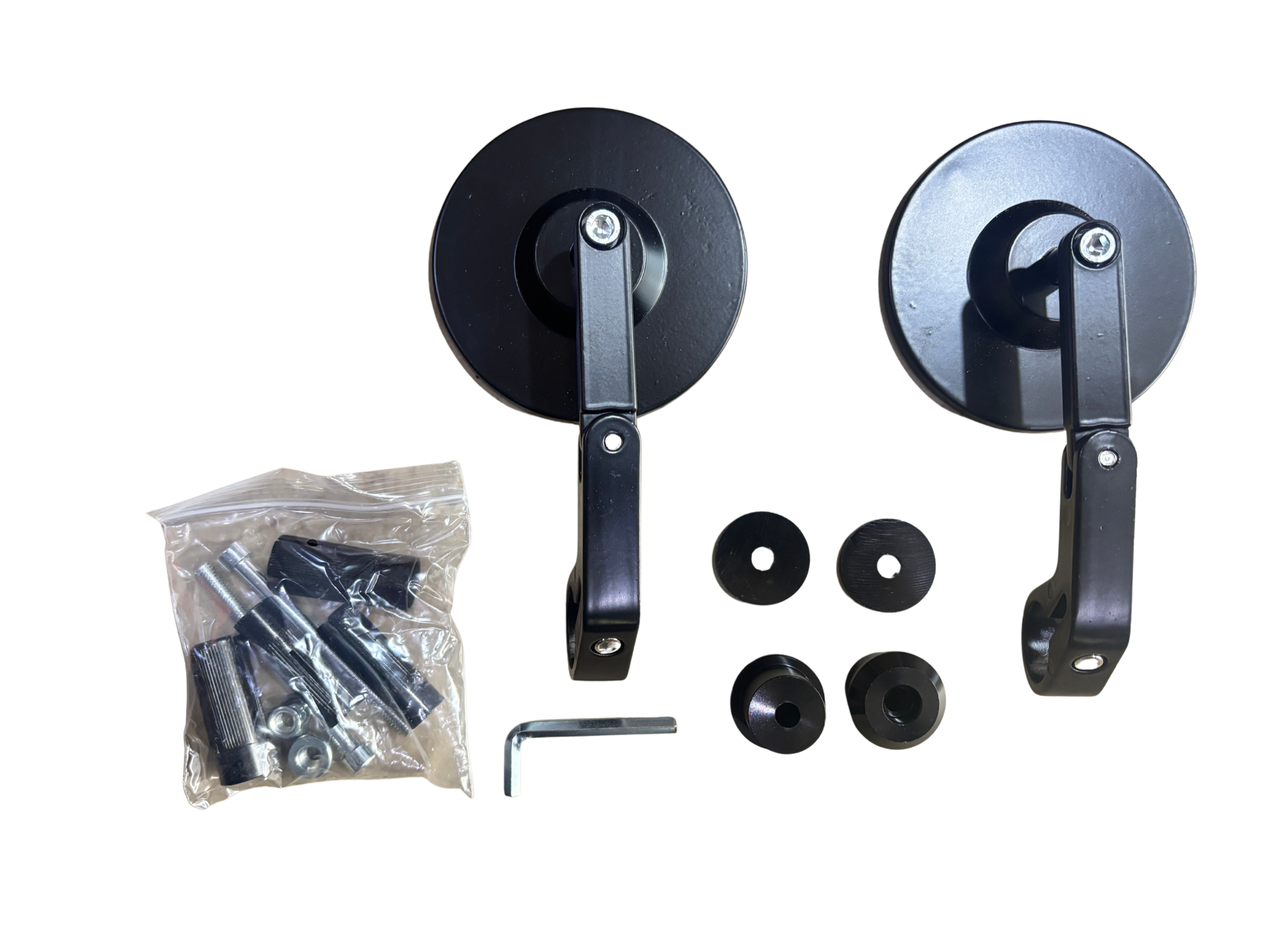 20068622-504e-41cc-85bf-fae3c4ae7812 - laxmiautocare.com Two black metal wheel assemblies with vertical arms and round discs, plus accompanying screws, washers, and a bag of hardware laid out.