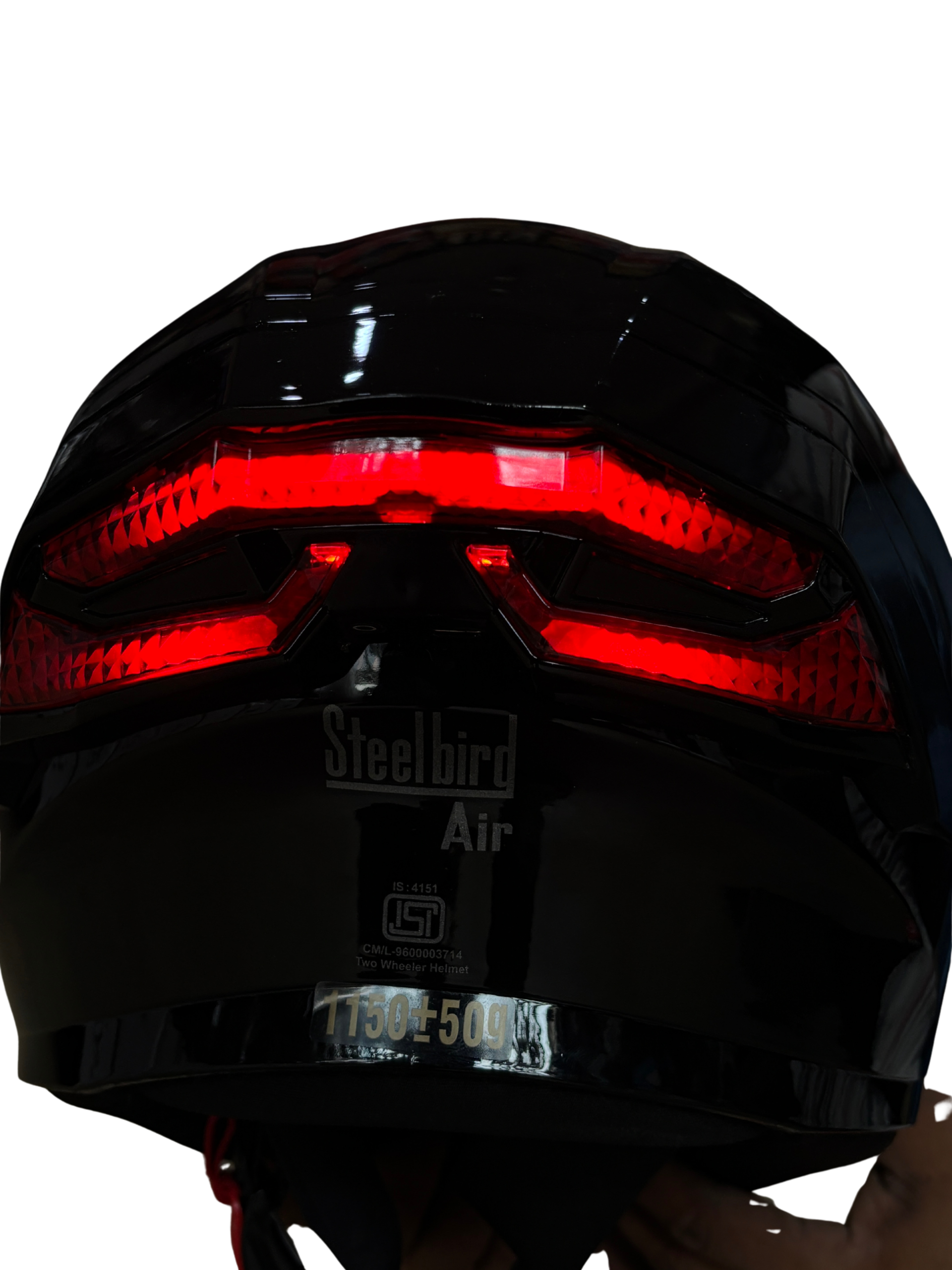 3fb5d3d6-e46a-41d1-a310-4a1f03d7f2f5 - laxmiautocare.com Rear view of a black motorcycle helmet with glowing red tail lights and 'Steelbird' branding visible on the back.