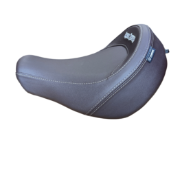 Close-up of a dark gray motorcycle/scooter seat featuring white contrast stitching and a small blue logo tag on the side.