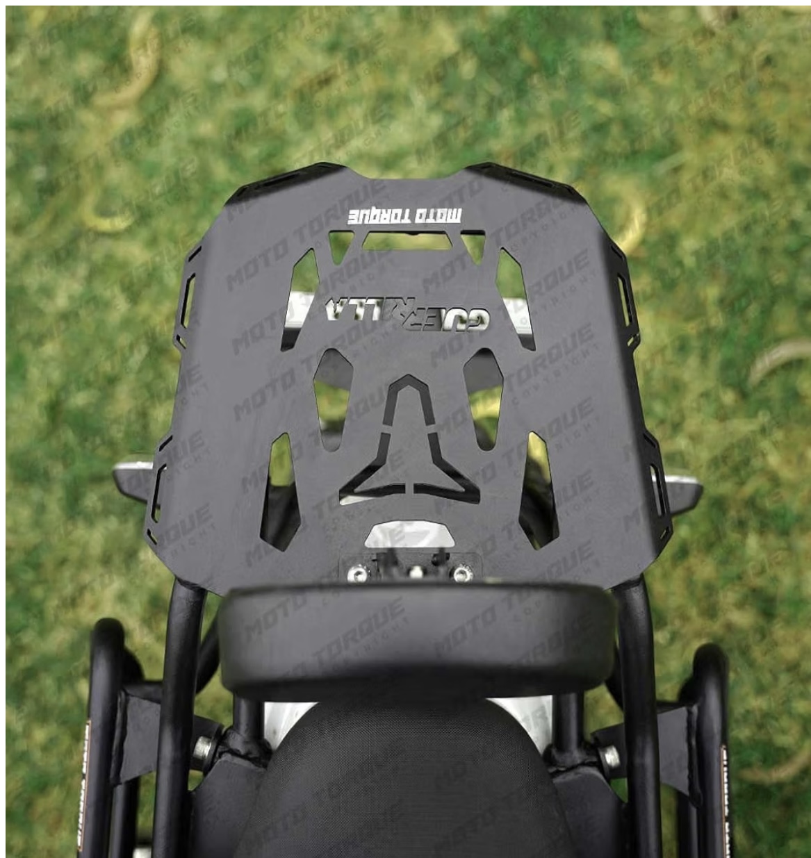 Top-down view of a gray off-road motorcycle helmet with ventilation cutouts, mounted on a bike.
