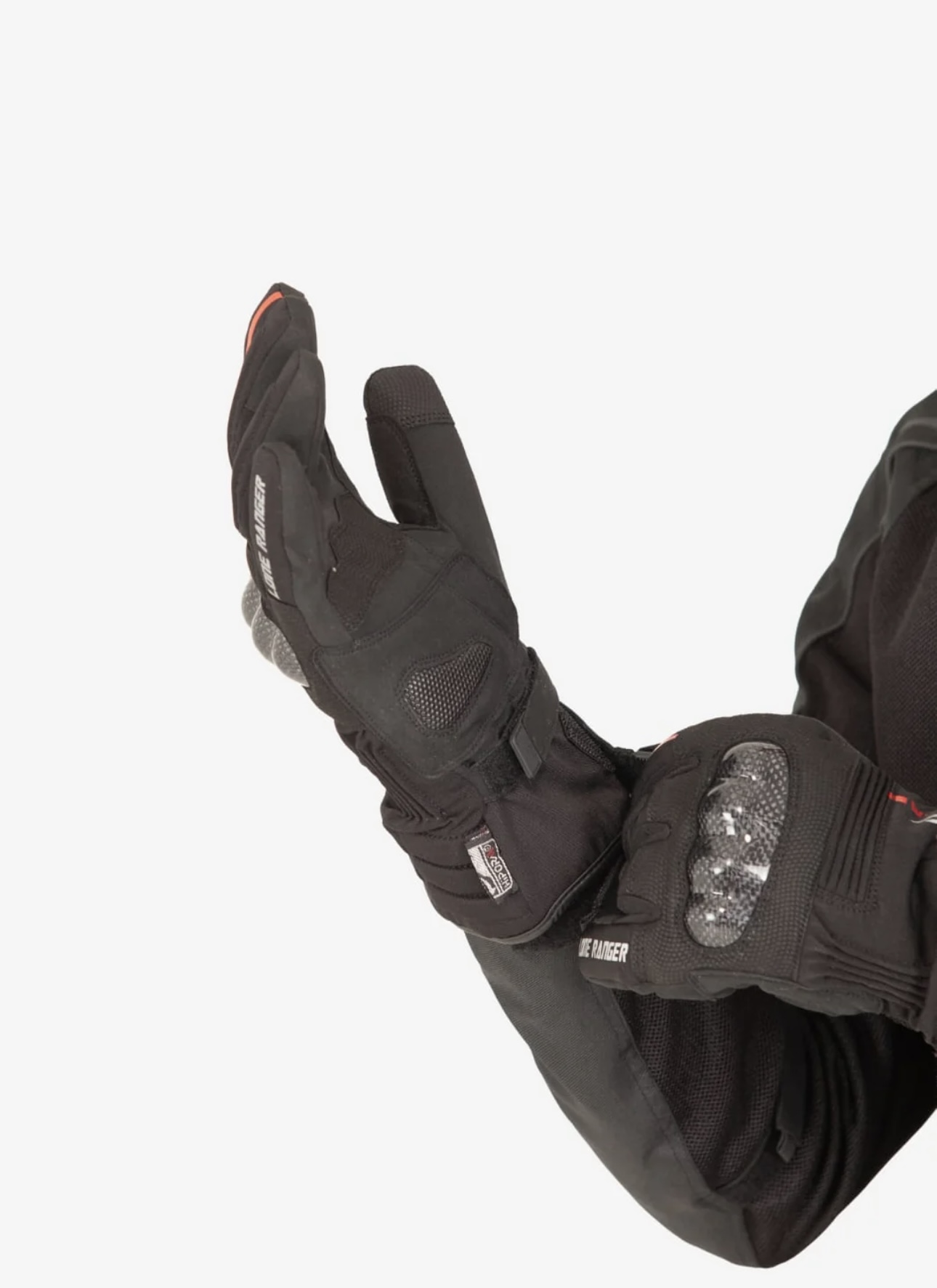 Screenshot - laxmiautocare.com Black motorcycle glove with knuckle protectors and padded palm (close-up).