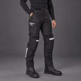 Screenshot - laxmiautocare.com Black tactical cargo pants with multiple pockets, knee straps, and reflective accents, paired with black boots