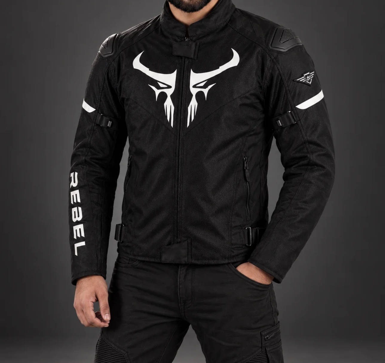 Black motorcycle jacket with a white horned skull logo on the chest, including shoulder protection and zip pockets.
