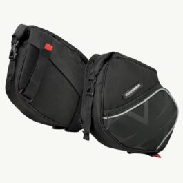 Screenshot - laxmiautocare.com Dual black motorcycle pannier bags attached together, with red zipper pulls and a small front pocket.